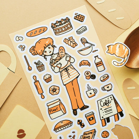🥐☕️ Spend a cozy day at the bakery with this charming sheet, where fresh loaves, sweet treats, and warm cups of coffee await! From mixing batter and rolling dough to sneaking a quiet break with something delicious, it’s all about the simple joys of baking.&nbsp;

Top Coating: None
Adhesive Layer: PVC (plastic)
Backing Layer: Clear PET
6.69" x 3.54".
Weight - 0.03lbs.
1 sheet included &nbsp; &nbsp;