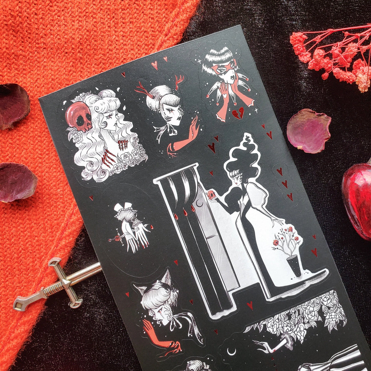 🖤🥀 Let your valentine know how your black heart beats for them with @stefanirabideaux’s stunning dark gothic Valentine set. Glamorous ladies, crimson gloves, skulls, and roses drift beneath a star-speckled night. With gleaming foiled hearts that shimmer like stardust, this striking sheet celebrates love at its most dramatic, decadent, and enduring.