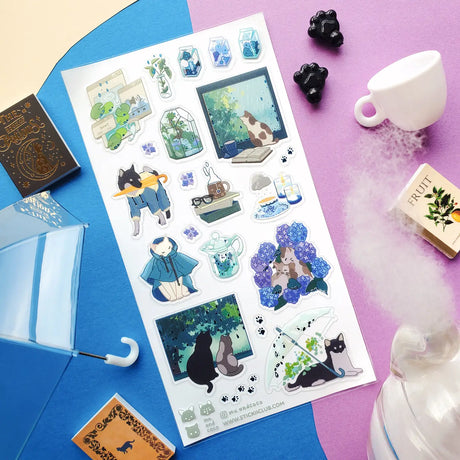 🌧️🐱 It’s raining, it’s pouring — so join @mu.andcoco’s adorable furballs for a day of drizzly adventures! Some cozy up by the window with a warm drink, while others slip on their rain ponchos and head out for a misty stroll. This sheet has everything you need to create the purr-fect rainy day spreads.