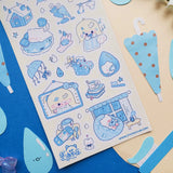 ☔💙 Cozy up and let the rain fall with this soothing blue-toned sheet! Filled with sleepy cats, soft blue umbrellas, rainy windows, warm drinks, and quiet little indoor moments, it captures all the best parts of a slow rainy day. Perfect for anyone who loves the peaceful magic of staying in, getting comfy, and listening to the gentle sound of raindrops outside.