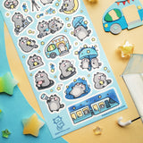 🌟🦝 Adventure calls, and these chonky little stargazers by @papermilio are answering, with snacks packed and eyes on the sky! From peeking through telescopes and wishing on shooting stars to camper trips, and umbrella strolls beneath twinkly skies, these cosmic cuties are following the stars—wherever they may lead.