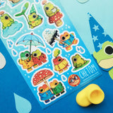 ☔🐸 It’s raining, it’s pouring, and @_chetom’s charming froggy crew is hopping with joy! Dressed in bright raincoats and boots, these cuties are embracing every drop as they splash through puddles, share umbrellas, and sip warm tea atop toadstools.