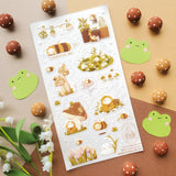 🌻🐝 Buzz on over to @bunnybee.garden’s whimsical garden, where chubby bunny-bees flutter through fields of flowers and cozy mushroom hideaways. From watering plants and zooming past blooming petals to splashing in puddles and snoozing in grassy corners, this sheet is bee-yond adorable.

Art by: @bunnybee.garden

Top Coating: None
Adhesive Layer: PVC (plastic)
Backing Layer: Clear PET
6.69" x 3.54".
Weight - 0.03lbs.
1 sheet included 
