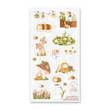 🌻🐝 Buzz on over to @bunnybee.garden’s whimsical garden, where chubby bunny-bees flutter through fields of flowers and cozy mushroom hideaways. From watering plants and zooming past blooming petals to splashing in puddles and snoozing in grassy corners, this sheet is bee-yond adorable.

Art by: @bunnybee.garden

Top Coating: None
Adhesive Layer: PVC (plastic)
Backing Layer: Clear PET
6.69" x 3.54".
Weight - 0.03lbs.
1 sheet included 