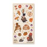 🐹🍎 In @anikeru’s whimsical corner of the woods, autumn’s bounty is gathered by the sweetest of friends. A dapper black cat carries fresh berries, mice and hamsters tuck into plump fruits and seeds, and a toad carries treasures on its back. It’s a season painted in warmth, where every creature has a story to share.