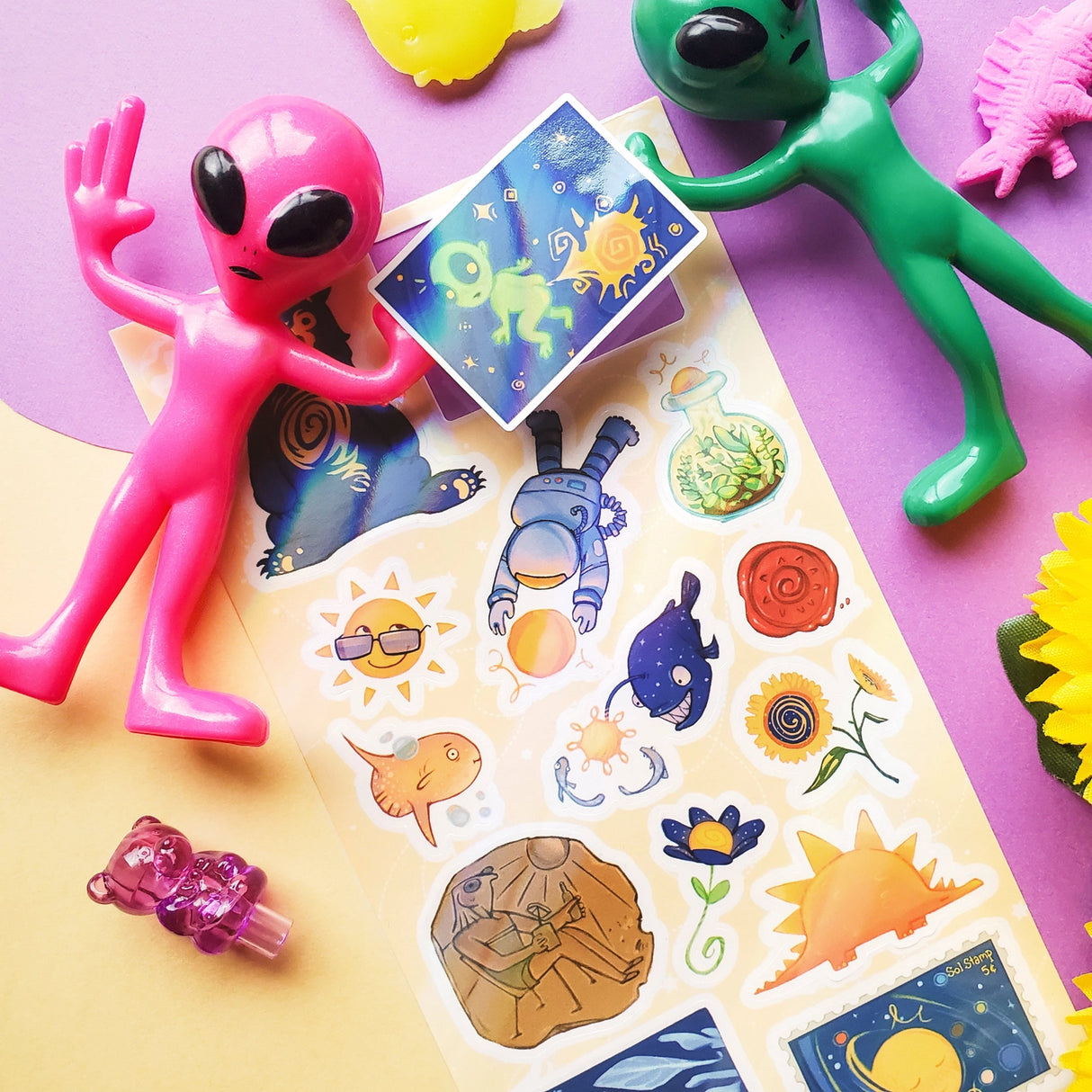 ☀️✨ Turn up the cosmic heat with @wizard.legs’ brilliant solar squad! From a chilled-out sun bear and a groovy dino-sun to a slick sunfish just vibing in its own bubbles, this sun-themed entourage has range while sunflowers, space explorers, and stellar oddballs whirl around in radiant orbit. It’s a whole universe of suns, each shining in their own wonderfully weird way.