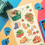 🥕🐶 Let’s go to the cutest farmers market ever with @yumbrite’s veggie pups! From carrot doggos zooming around with leafy greens to tomato buddies piling into produce baskets, these pals take “farm to table” fun very seriously. Packed with fresh produce, playful pups, and wholesome charm, this sheet has us excited for our greens!

Art by: @yumbrite

Top Coating: None
Adhesive Layer: Paper
Backing Layer: Paper
6.69" x 3.54".
Weight - 0.03lbs.
1 sheet included 