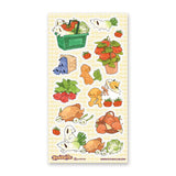 🥕🐶 Let’s go to the cutest farmers market ever with @yumbrite’s veggie pups! From carrot doggos zooming around with leafy greens to tomato buddies piling into produce baskets, these pals take “farm to table” fun very seriously. Packed with fresh produce, playful pups, and wholesome charm, this sheet has us excited for our greens!

Art by: @yumbrite

Top Coating: None
Adhesive Layer: Paper
Backing Layer: Paper
6.69" x 3.54".
Weight - 0.03lbs.
1 sheet included 