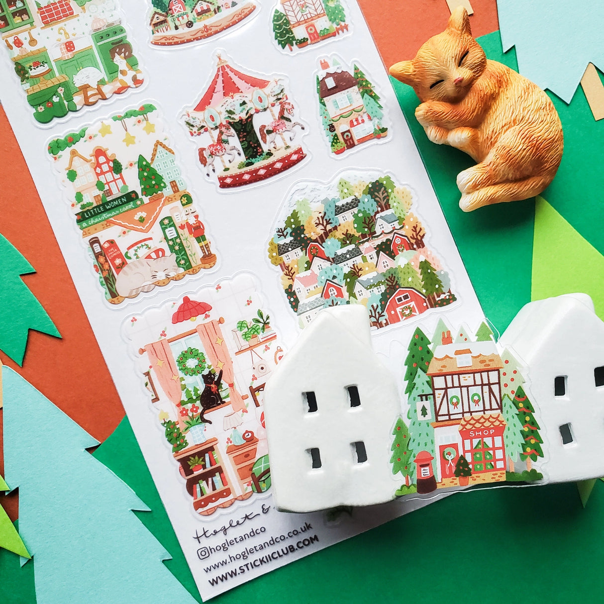 🎄🏡 Welcome to @hogletandco’s cozy winter village! From twinkling carousels to snowy cottages and curious cats by snowy windows, this charming town is brimming with holiday cheer. Take a stroll through festive markets, peek into storybook shops, and watch the magic of the season unfold.

Top Coating: None
Adhesive Layer: PVC (plastic)
Backing Layer: Clear PET
6.69" x 3.54".
Weight - 0.03lbs.
1 sheet included&nbsp;