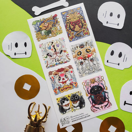 🪙🐸 Luck meets mischief in this enchanting sheet by @nantoka_keiko. In this wild festival of fortune: coin-loving frogs, dancing skeletons, and quirky spirit creatures stack coins, ring bells, and summon good vibes in the most unexpected ways. Stick them anywhere you need a boost of magic, sparkle, and playful fortune!

Art by: @nantoka_keiko