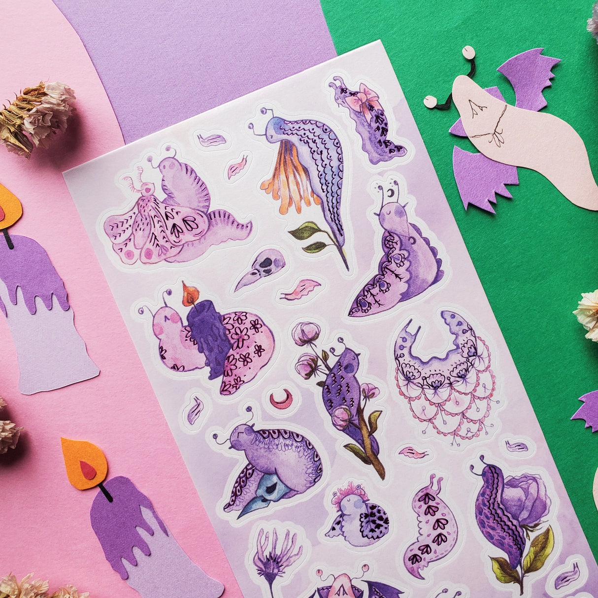 STICKII Gothic Garden Slugs Sticker Sheet

🐌💜 Okay what’s more magical than these gothic cuties from @agataplank? These slugs are dramatic and slow which is a such a vibe to strive for as they are dressed up in their softest florals, ruffliest lace, and you have to have a cape. Then do all the magical gothic activities with spooky gardens, spell books and charm!