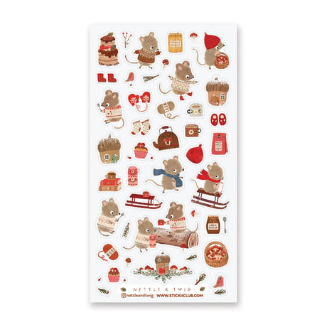 🐭☕️ Cozy up with @nettleandtwig’s snug little mouse village, where winter days are filled with woolly sweaters, steaming cocoa, and muffins fresh from the oven! Among snow-dusted acorn cottages, these tiny friends spend their time sledding, knitting, and sharing warm moments by the fire.

Top Coating: None
Adhesive Layer: PVC (plastic)
Backing Layer: Clear PET
6.69" x 3.54".
Weight - 0.03lbs.
1 sheet included&nbsp;