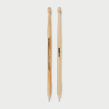SUCK UK Drumstick Pencils

Some ideas arrive quietly. Others arrive in the middle of a drum break. Whether you're composing a rock-balled or just avoiding maths homework, drumstick pencils are always ready for an impromptu drum solo on the rim of your mug. Tap your way through the day with a pair of drumsticks that occasionally double as pencils. An ideal gift for fidgety creative thinkers.

Pair of pencils shaped like drumsticks.
Made from responsibly sourced wood.
Quiet alternative to a full-size drum kit