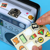 Cool kids bring their own lunch. The coolest kids carry lunch like it's 1989 and you're a street-wise New-York Hip-Hop kid. A classic tin lunch box disguised as a super cool retro ghetto blaster. Big enough for a good size packed lunch and fun enough for both kids and adults. Experience the nostalgia of the 80s. Keep your food fresh and organized. This is not just a lunch box, this is a statement of intent!&nbsp;

Durable and built to last the rigours of school.
Animated lenticular graphic equalizer.
Metal 
