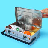 Cool kids bring their own lunch. The coolest kids carry lunch like it's 1989 and you're a street-wise New-York Hip-Hop kid. A classic tin lunch box disguised as a super cool retro ghetto blaster. Big enough for a good size packed lunch and fun enough for both kids and adults. Experience the nostalgia of the 80s. Keep your food fresh and organized. This is not just a lunch box, this is a statement of intent!&nbsp;

Durable and built to last the rigours of school.
Animated lenticular graphic equalizer.
Metal 