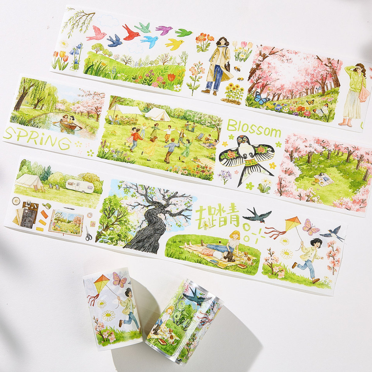 Step into a world where spring never ends. Our Sakura Voyage tape is a panoramic journey through a watercolor dreamland. Featuring hand-painted sceneries of weeping willows swaying in the breeze, vibrant kites dancing in the sky, and soft cherry blossoms in full bloom, every inch tells a story. 

Brand: WT ( The Washi Tape Shop)
Pre-cut Wide Washi/PET Tape
Size: 70mm×5m
Design Loop: 100cm
Material: Washi Tape / PET Clear Tape