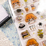 It starts with being woken up by an alarm clock, eating, drinking, watering flowers, enjoying notebook time, reading, and rumbling. Pepper's expression and gestures are very adorable stamps. My partner cat is also cute! It is practical and easy to use as a notebook.

This stamp set is a collaboration between Sakuralala and Love Soup, an Australian artist based in Japan that illustrates pictures of Lazy Girl Pepper. These stamps are the perfect addition for your journal or planner!