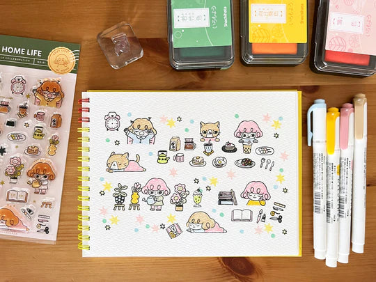 It starts with being woken up by an alarm clock, eating, drinking, watering flowers, enjoying notebook time, reading, and rumbling. Pepper's expression and gestures are very adorable stamps. My partner cat is also cute! It is practical and easy to use as a notebook.

This stamp set is a collaboration between Sakuralala and Love Soup, an Australian artist based in Japan that illustrates pictures of Lazy Girl Pepper. These stamps are the perfect addition for your journal or planner!