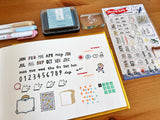 These stamps are just what you're looking for to start a new notebook at the beginning of the year! 963hanko's cute letters such as the month, day of the week, and numbers, weather marks, dogs of joy, anger, sorrow, and other motifs and patterns that can also be used as date labels. As the name of the stamp of "Planning Buddy" suggests, it's sure to be your buddy!
