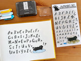 Clear stamp "Vincent's Alphabet" was created in collaboration with Paper Plant Co. The owner, Friedia, has a cute alphabet stamp with an atmospheric and gentle typeface.

This stamp set is a collaboration between Sakuralala and Paper Plant Co., a stationery store located in Los Angeles, USA. The dog that appears in the Paper Plants Co. shop logo and clear stamp is Vincent, who is also the store's mascot. These stamps are the perfect addition for your journal or planner!