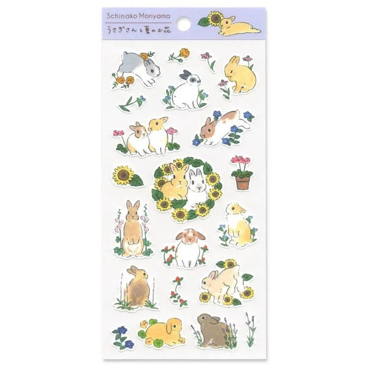 A sticker sheet with golden touches featuring rabbits jumping around in a summer field of flowers is here to add both adorable and elegant touches to your journal pages
