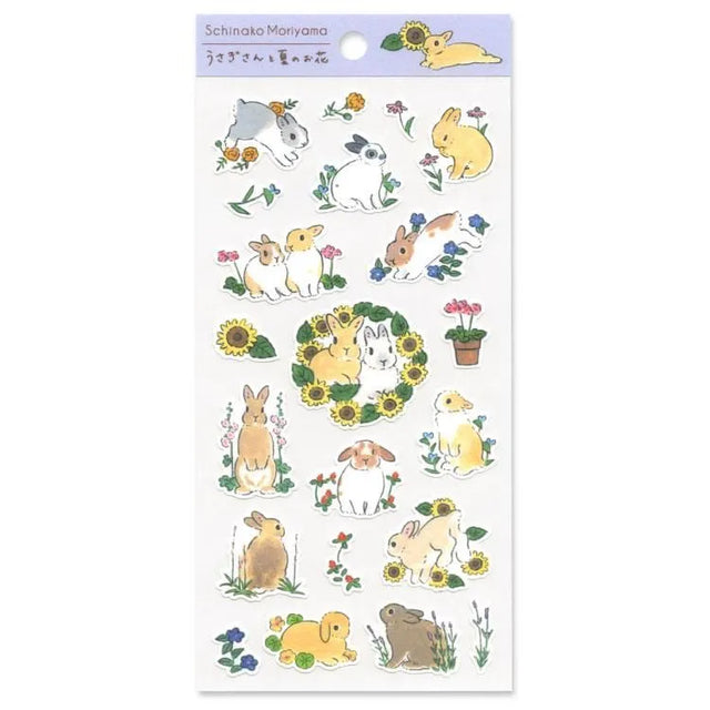 A sticker sheet with golden touches featuring rabbits jumping around in a summer field of flowers is here to add both adorable and elegant touches to your journal pages