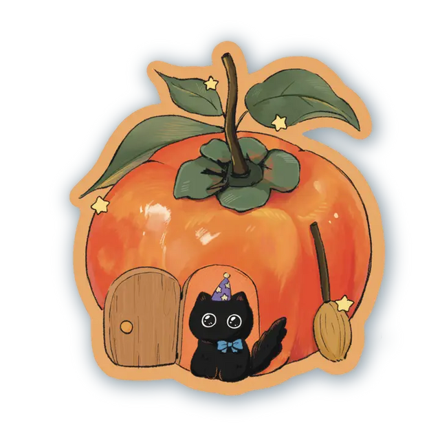 A small black kitty finding home in a persimmon.

Dishwasher safe
Size: 2.4” x 2.7”
Soft matte vinyl
