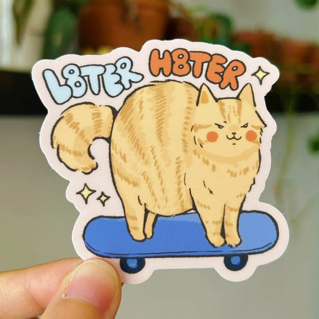 Sticker that shows you are not bothered by the haters.

Dishwasher safe
Size: 2.7”
Soft matte vinyl