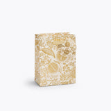 Giving gets even more special with our gift bags, which feature charming extras like gold foil accents, cotton ribbon handles, and a coordinating “To” and “From” tag.

Small: 6 x 4.5 x 0.3 in
Coated paper with cotton ribbon handles
Printed in full color and UV gold glitter
Gold lurex ribbon handles
Cardboard floor insert