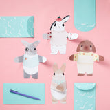 This adorable stationery lets you send your message wrapped up in a snuggly bunny hug! With folded hugging arms so the bunnies can sit up to be displayed, each of these 12 cute greeting cards and envelopes will send a big bunny snuggle to your friends and family. Perfect for hoppy occasions, springtime affections, Easter greetings, and any reason to send a long-distance hug.

VARIETY OF BUNNIES: This set includes four adorable bunny designs, appropriate for any occasion that requires a big hug, happy or sad