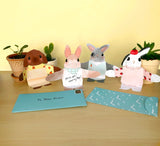 This adorable stationery lets you send your message wrapped up in a snuggly bunny hug! With folded hugging arms so the bunnies can sit up to be displayed, each of these 12 cute greeting cards and envelopes will send a big bunny snuggle to your friends and family. Perfect for hoppy occasions, springtime affections, Easter greetings, and any reason to send a long-distance hug.

VARIETY OF BUNNIES: This set includes four adorable bunny designs, appropriate for any occasion that requires a big hug, happy or sad