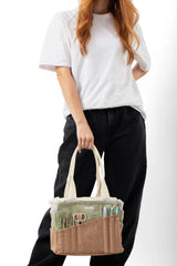 Your art is bold. Your bag should be too. The world's most loved art supply bag, pottery tool bag & knitting project bag – backed by over 10,000 global artists!

✌️ 15 stunning colors ✌️

🌈 Over 30 Pockets Of Varying Sizes
🌈 Slanted Skinny Pockets : For your most-loved tools that beg for your attention (carving tools, knitting needles, crochet hooks
🌈 Large Interior Storage + 2 interior pockets: Perfect for carrying glazes, knitting yarn, crochet supplies, and craft supplies
🌈 Phone & Wallet Compartment