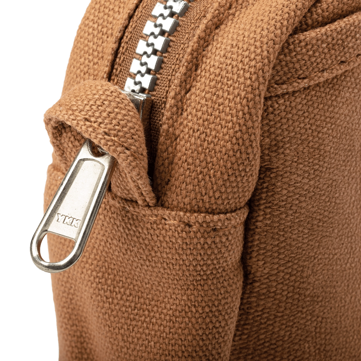 Features &amp; Specs

Front layout: 8 slanted pockets + 3 directly behind
Interior: Main compartment fits an A5 notebook; two open compartments on each wall
Back panel: 3 wide exterior pockets + one full-length slip pocket&nbsp;
Quick-drying duck canvas — sturdy, breathable, and machine-washable
Convertible design — hooks for your own strap or a Soolla strap (coming soon)&nbsp;
Structured silhouette — holds its shape even when lightly packed
Full-width YKK zipper — smooth and durable
Compact profile — fits 