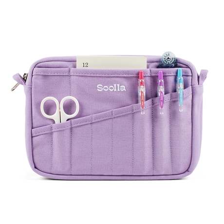 A compact carry-all pouch for artists, makers, and stationary lovers who appreciate a little order in their chaos. Structured enough to hold its form, soft enough to fit anywhere, and fully machine-washable for the days that get a little messy — your tools, pens, and creative essentials stay safe, visible, and ready wherever you go.

Inside, 20 pockets make space for art supplies, stationary essentials, and an A5 notebook, all secured by a smooth YKK zipper. Sized to fit within larger bags or carry on its o