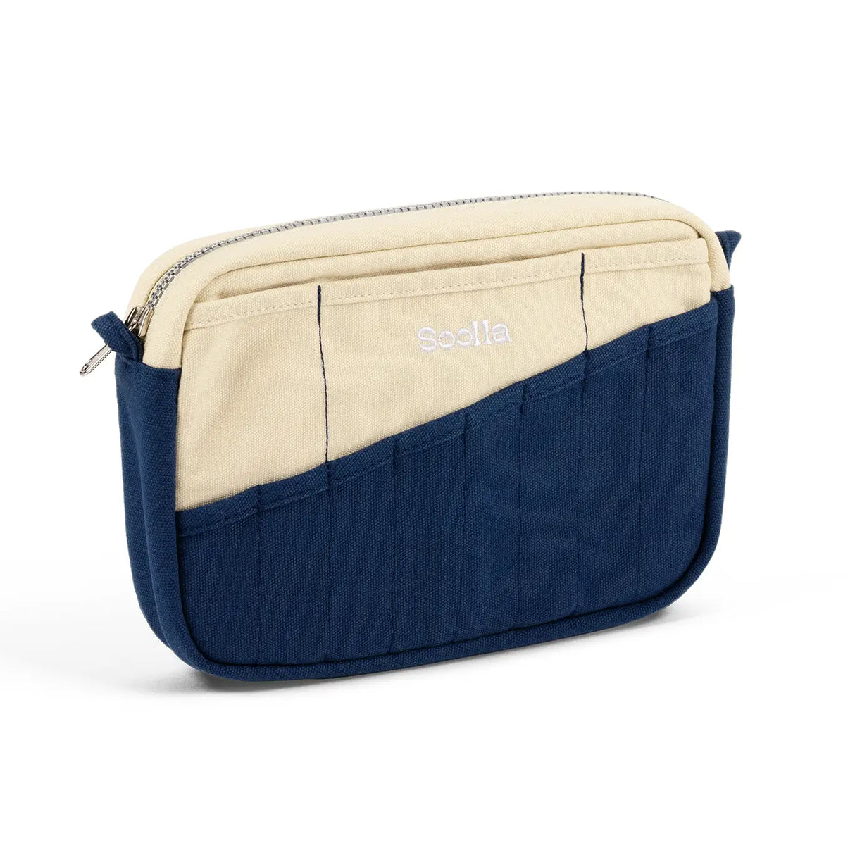 A compact carry-all pouch for artists, makers, and stationary lovers who appreciate a little order in their chaos. Structured enough to hold its form, soft enough to fit anywhere, and fully machine-washable for the days that get a little messy — your tools, pens, and creative essentials stay safe, visible, and ready wherever you go.

Inside, 20 pockets make space for art supplies, stationary essentials, and an A5 notebook, all secured by a smooth YKK zipper. Sized to fit within larger bags or carry on its o