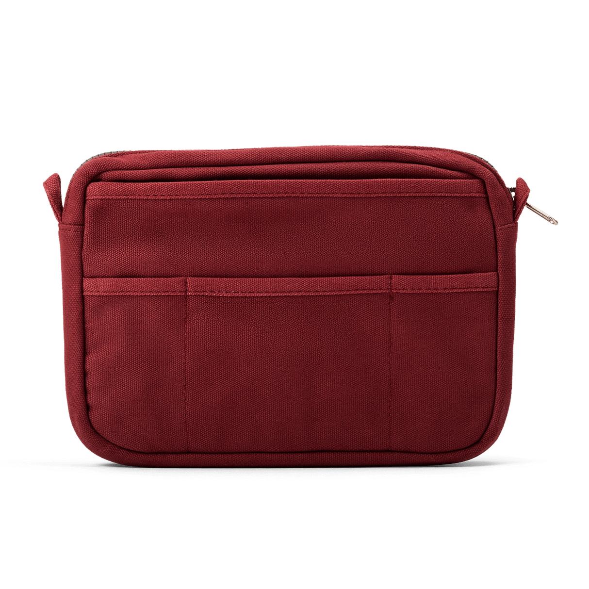 Front layout: 8 slanted pockets + 3 directly behind
Interior: Main compartment fits an A5 notebook; two open compartments on each wall
Back panel: 3 wide exterior pockets + one full-length slip pocket&nbsp;
Quick-drying duck canvas — sturdy, breathable, and machine-washable
Convertible design — hooks for your own strap or a Soolla strap (coming soon)&nbsp;
Structured silhouette — holds its shape even when lightly packed
Full-width YKK zipper — smooth and durable
Compact profile — fits inside larger bags or 
