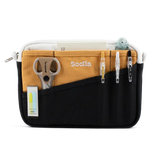 A compact carry-all pouch for artists, makers, and stationary lovers who appreciate a little order in their chaos. Structured enough to hold its form, soft enough to fit anywhere, and fully machine-washable for the days that get a little messy — your tools, pens, and creative essentials stay safe, visible, and ready wherever you go.

Inside, 20 pockets make space for art supplies, stationary essentials, and an A5 notebook, all secured by a smooth YKK zipper. Sized to fit within larger bags or carry on its o