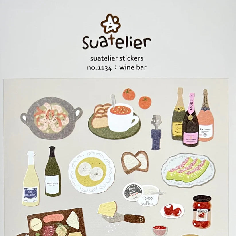 Bring a cozy, charming atmosphere to your planners, journals, and creative projects with the Suatelier “Wine Bar” Sticker Sheet. This beautifully illustrated set captures the warm, intimate feel of a night out. Suatelier’s signature soft colors and minimalist illustrations make this sheet an easy match for any stationery style.

• This package includes 1&nbsp;sheet of sticker
• Package measures approx. 8" x 3.5"