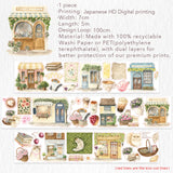 Step into a world where nature and comfort collide. Our Summer Café Wide Tape transforms your stationery into a bustling garden bistro, teeming with life, blooming flowers, and the true owners of the cafe: the cats.

This whimsical design weaves together the architecture of charming coffee shops with the wild beauty of summer florals. Nestled among the potted plants and open doors, you’ll find hand-painted cats exploring, sleeping, and playing.&nbsp;
