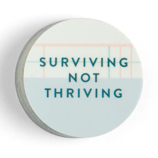 For when you’re making it through, one overthought decision at a time. This Surviving Not Thriving sticker is a relatable and witty addition to your laptop, water bottle, or planner. With a minimalist design and soft color palette, it’s perfect for anyone who appreciates self-aware humor and a good productivity struggle. A great gift for students, coworkers, or anyone navigating the chaos of daily life!
