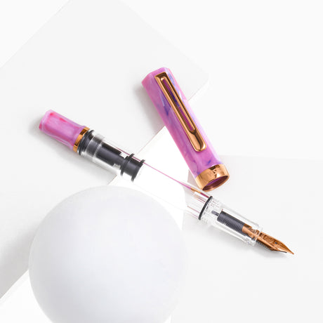 TWSBI ECO Fluorite w/ Bronze Fountain Pen

Comes in&nbsp;EF, F, M, B, Stub1.1 nib choices

Pen cap is&nbsp;able to post&nbsp;onto the back of the pen

Piston Filler Fountain pen.
Simply unscrew the end cap, dip into ink, screw back the end cap, and you're done! Ready to write!!

Pen cap has an inner cap to ensure a perfect seal when stored away.&nbsp;
Made for the beginner who just wants to try out fountain pens, all the way to the experts. A good everyday worker.

Please note: Ink is NOT included

A quick 