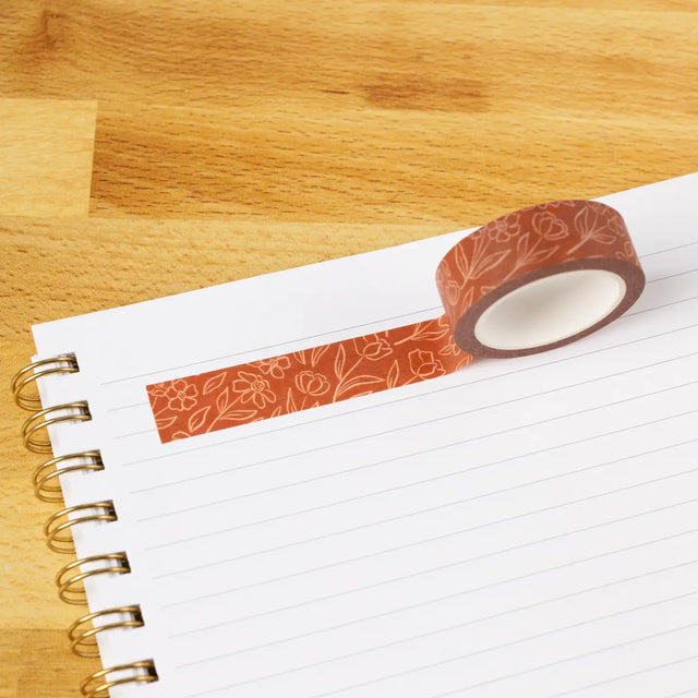 Terracotta Floral Washi Tape

Our washi tape is made for paper lovers, pen pals, and anyone who gets butterflies in the stationery aisle. Perfect for journaling, scrapbooking, decorating envelopes, or adding a personal touch to planners and calendars. It's gentle on paper, easy to tear by hand, and removable without leaving residue, so you can rearrange, redo, and re-stick as needed.

Design Features:&nbsp;

Each roll measures 15mm wide on a 10m roll
Full color repeating pattern
Washi tape dispenser packagi