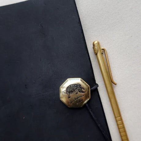 The SUPERIOR LABOR Brass Concho is a stylish, functional accessory designed to add a touch of flair to everyday life. Crafted from solid brass, it is available in multiple designs including circle, star, oval, and heart.