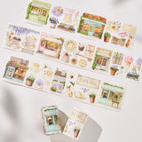 Celebrate the season of new beginnings with a design that marries architecture and nature. Our Spring Café Wide Tape is a watercolor love letter to the season, featuring quaint cafe facades almost hidden behind explosions of pastel bouquets and greenery.