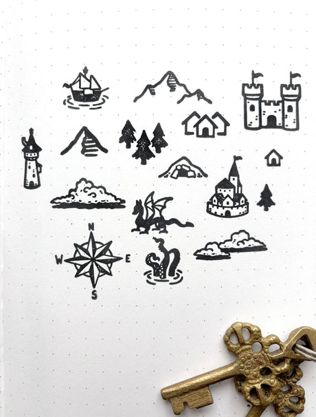 One set of 16 rubber stamps to DIY your own maps! Use this for brainstorming that next epic fantasy, or to keep track of locations in your ttrpg campaign. Stamps range in size from 10x10 to 30x30mm, and are each 24mm tall. The set will come packed in a cute little paper drawer box. 

