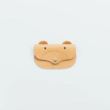A wallet with a bear motif.

It is durable and can be used for many years, and the design is cute and makes a nice accent.

Size: W15.5×H10.5cm
About the Leather – Japanese Glove Leather

Made from durable and supple Japanese glove leather, known for its lightness and strength.

Originally used for baseball gloves, this leather is highly resistant to friction and becomes softer and more comfortable over time.

Its rich color comes from the deep-dyeing process, in which dye penetrates all the way to the core