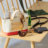 A coin purse with a bird motif.

It is small enough to carry in your pocket when you are out and about. Compact and sturdy, it can be used for many years and has a cute design that adds a nice accent to its appearance.

Size: W11×H6.5cm
Leather Products
We use natural leather. While we avoid pieces with damage that could cause tearing, natural marks, wrinkles, and other characteristics are part of the leather’s charm and may be present on the product. Even within the same type of leather, color, thickness, 