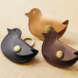 The SUPERIOR LABOR Bird Coin Case

A coin purse with a bird motif.

It is small enough to carry in your pocket when you are out and about. Compact and sturdy, it can be used for many years and has a cute design that adds a nice accent to its appearance.

Size: W11×H6.5cm
