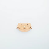 A coin purse with a dog motif.

It is small enough to carry in your pocket when you are out and about. Compact and sturdy, it can be used for many years, and the design is cute and makes a nice accent.