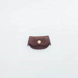 A coin purse with a dog motif.

It is small enough to carry in your pocket when you are out and about. Compact and sturdy, it can be used for many years, and the design is cute and makes a nice accent.